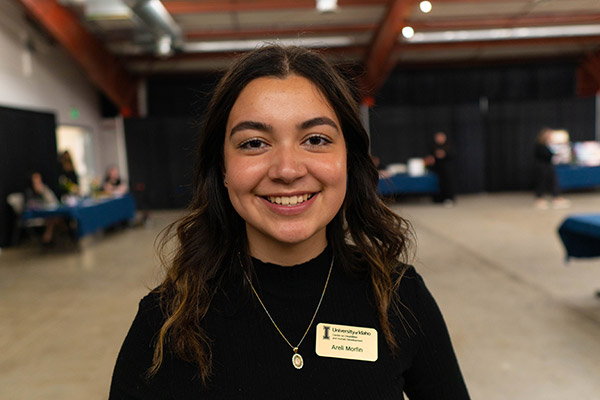 Areli Morfin smiles broadly at the camera at the Latah County Fairgrounds ahead of the artAbility Showcase.