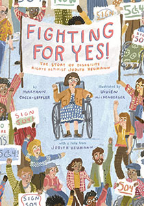 Book cover with an illustration of a woman in a wheelchair in the center of a crowd of people of different races and abilities. They are all holding their hands up or holding protest signs up about disability inclusion.