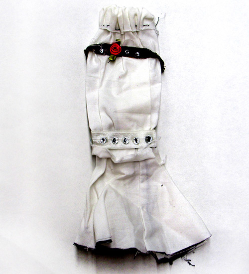 A white doll's dress. Click to enlarge image.