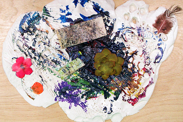 Gabe's clay art piece showcasing different colors, textures and materials. Click to enlarge image.