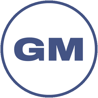 A white circle with a blue outline. At the center of the circle are the letters G and M.